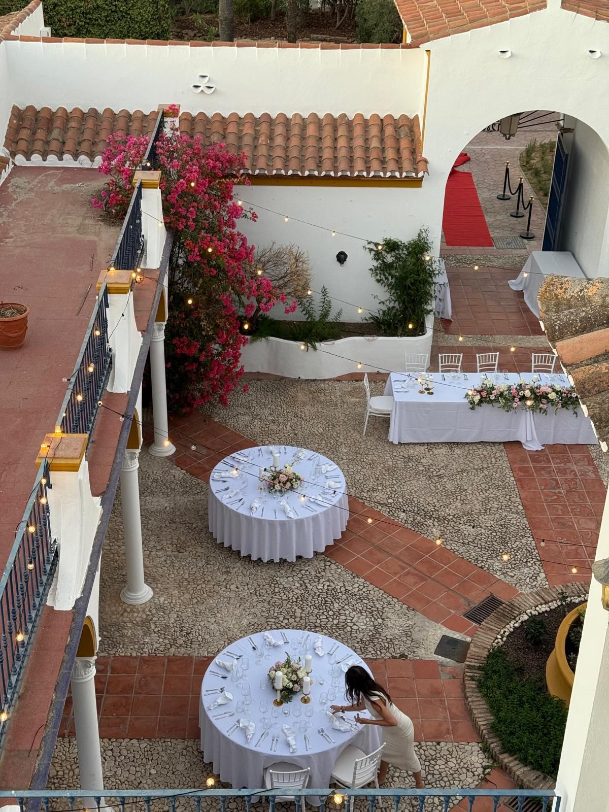 Wedding dinner set in a whitewashed Andalusian courtyard